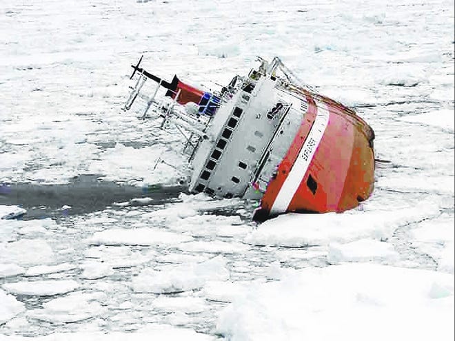 In this photo released by Chile's Navy, the Liberian-flagged Explorer cruise ship is seen sinking after it hit an object in Antarctic waters, Friday, Nov. 23, 2007, some 880 kilometers southeast of Ushuaia, the southernmost Argentine city. More than 150 passengers and crew took to lifeboats after the ship hit an object and began taking on water through a hole in the hull, naval and coast guard officials said. No injuries were reported. (AP Photo/Chile's Navy)