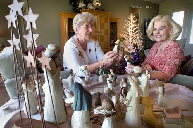 Syble Miller, left, one of the designer for the Lake Ashton Holiday Home Tour, and event co-chair Louise Gilla are in one of the model homes decorated for the tour,