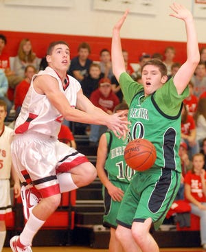 Vernon-Verona-Sherill's Zack Jensen, left, has the ball knocked from his hands by Herkimer's Jeff Mlinar in a non league boys basketball game, Wednesday, Nov. 28, 2007, at VVS High School in Verona.