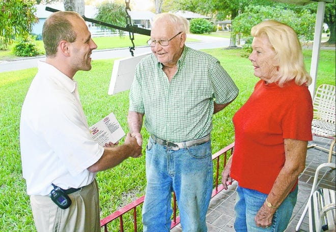 From left, Lakeland City Commission candidate Justin Troller meets with Fred and Rose King this week. Of meeting Troller, Fred King said, "Now this is how you get elected the old-fashioned way, going door-to-door."