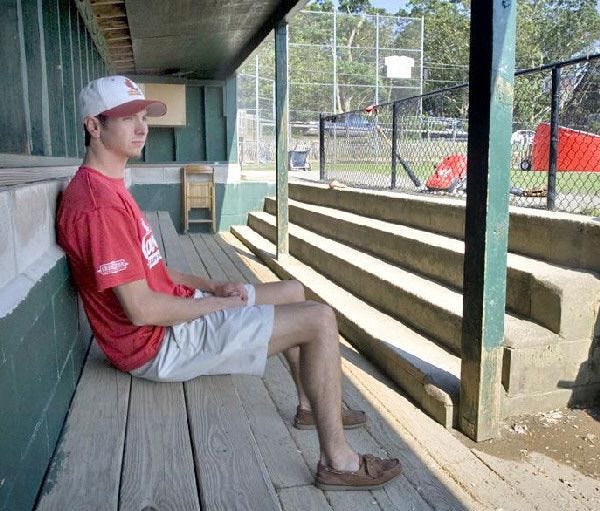 Clayton Shunick of the Orleans Cardinals had a moment to himself in the dugout before a 2006 game at Eldredge Park.