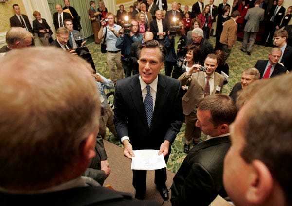 Republican presidential nominee hopefull Mitt Romney, center, greets Utah state legislatures at a fund-raiser gala in this Feb. 20, 2007, file photo in Salt Lake City. Despite 170 years of history, much about The Church of Jesus Christ of Latter-day Saints, the church Romney belongs to, remains a mystery to most. (AP Photo/Douglas C. Pizac, file)