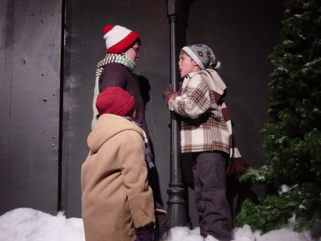 The Worcester Foothills offers an alternative to the big Boston blockbuster shows with "A Christmas Story." Here Ralphie and Schwartz look on after daring their friend Flick to see if his tongue would stick to a flagpole.