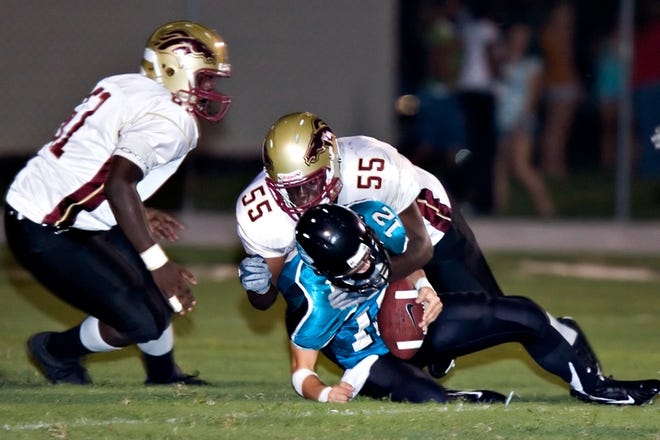 North Marion defensive end Mike Beard (55) has registered 48 tackles and 8½ sacks this season.