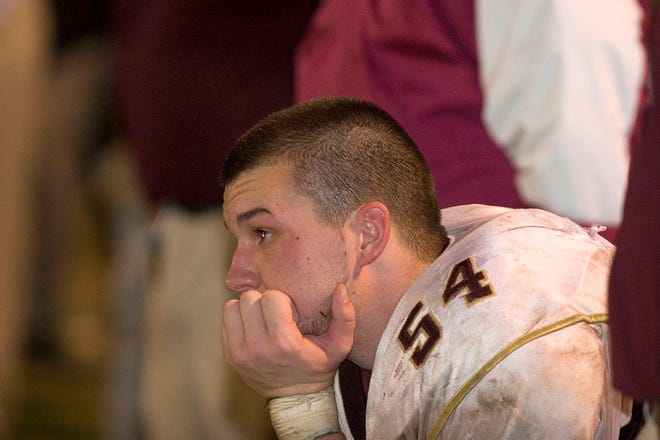 North Marion's Jon Allen watches the end of the Colts' 35-0 loss to St. Augustine in the Class 3A state semifinals.
