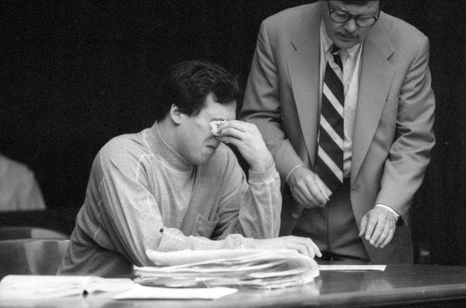 Michael Lee Perry, 17, weeps after Judge Leopold Borrello sentenced him to three concurrent life terms without parole for first-degree murder in Saginaw, Mich., in 1991.