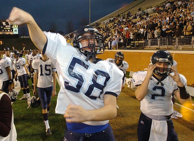 Hoggard's Cooper Dumas celebrates a fourth quarter touchdown against Mount Tabor in the 4-A championship game Saturday.