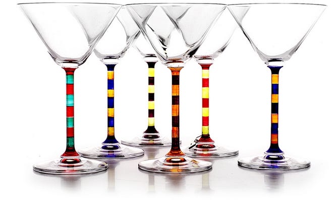 The stems of the martini glasses in the Capri Martini Set are hand-painted in Italy in two-tone strips and then fired at extremely high temperatures for color adhesion.