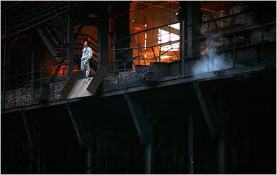 A worker took a break recently at a blast furnace of a steel plant in Handan, China. Residents live in a miasma of smoke.