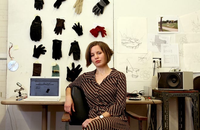 Jennifer Gooch, a graduate student in the Carnegie Mellon University School of Art, poses Nov. 30 for a portrait in her studio in Pittsburgh, Pa.