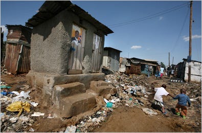 What’s left of a poster for Raila Odinga adorns an outhouse in Kibera, a Nairobi slum. Mr. Odinga is running for president, but must win a seat in Kibera, where he faces united opposition.