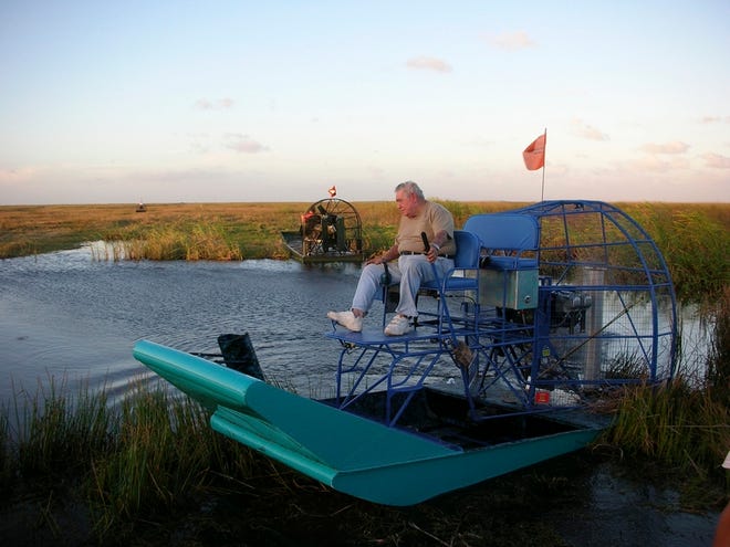 Bud Marquis, the airboater who was first on the scene of the Eastern Airlines Flight 401 crash in the Everglades on Dec. 29, 1972, rides his reconditioned airboat in the Florida Everglades.