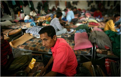 FROM BANGLADESH Tufazil Hussan, a street sweeper, shares a workers’ dormitory with 50 men.