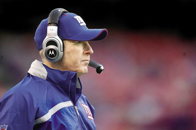 EAST RUTHERFORD, NJ - NOVEMBER 25: Coach Tom Coughlin of the New York Giants watches on from the sideline against the Minnesota Vikings at Giants Stadium on November 25, 2007 in East Rutherford, New Jersey. (Photo by Nick Laham/Getty Images)