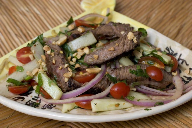 This Asian Beef Salad is easily adapted to chicken or shrimp and at only 195 calories per serving is kind to the waistline.