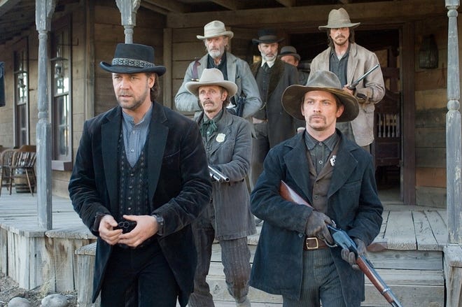 Ben Wade (Russell Crowe, front left), Kane (Chad Brummett, front right), Marshal Weathers (Luce Rains, middle left), Bryon McElroy (Peter Fonda, back left), Dan Evans (Christian Bale, back right), and Glen Hollander (Lennie Loftin, back center) star in "3:10 to Yuma."