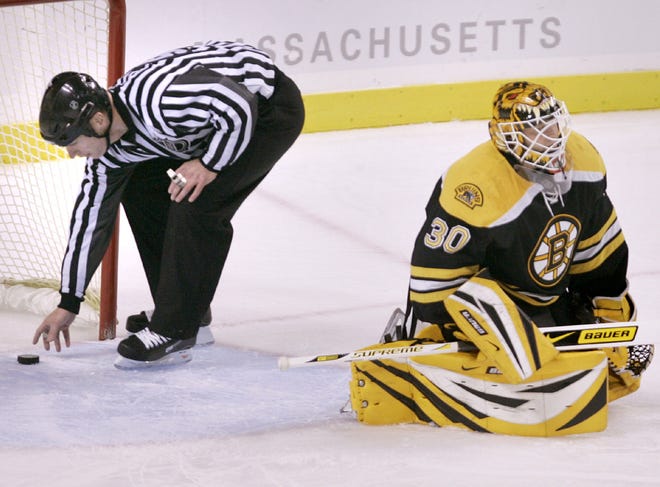 Boston Bruins goalie Tim Thomas sits on his pads after a goal by Montreal Canadiens Mathieu Dandenault during the third period of their NHL hockey game in Boston, Thursday Jan. 10, 2008. The Canadiens beat the Bruins 5-2.(AP Photo/Charles Krupa)