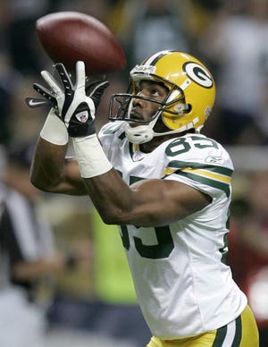 Green Bay Packers wide receiver Greg Jennings catches a 44-yard pass for a touchdown during the third quarter against the St. Louis on Dec. 16 in St. Louis.