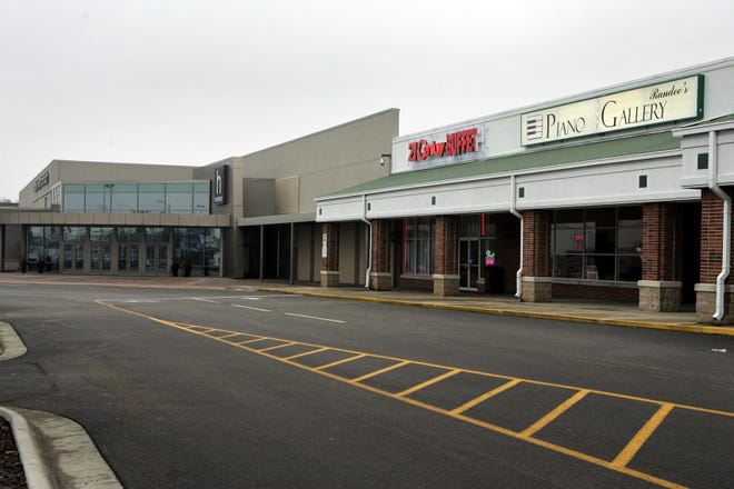 The former Colonial Village Mall, now owned by Heartland Church, houses the church and retail stores. City officials now have to determine which parts of the building are tax exempt, and which are taxable.
