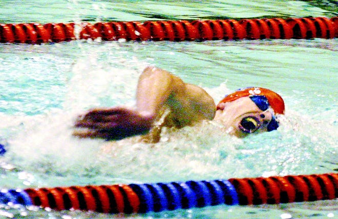 Tyler Benson of Fairport places first in the 500 freestyle in helping the Red Raiders knock Webster from the ranks of the undefeated last Thursday at home.