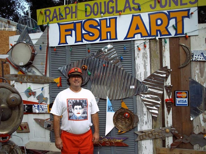 Ralph Douglas Jones offers his fish art from his outdoor art gallery on U.S. 80 on Tybee.