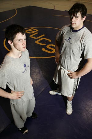 Belvidere High School 130-pound wrestler Jarred McIntosh (left) and heavyweight Harrison Ford are seen Tuesday, Jan. 22, 2008, during practice at the high school in Belvidere.