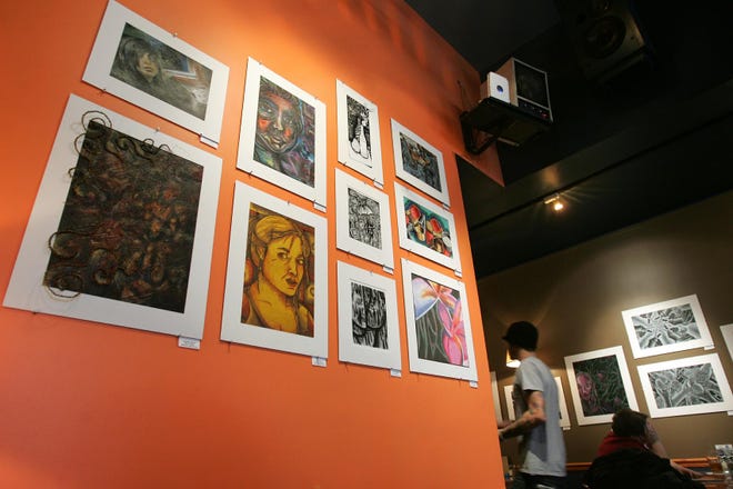 A display of numerous pieces for the All City High School Art Exhibit is shown at Octane InterLounge in Rockford on Jan. 18.