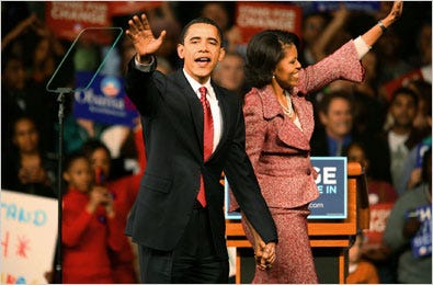 Senator Barack Obama and his wife, Michelle, greeting supporters.