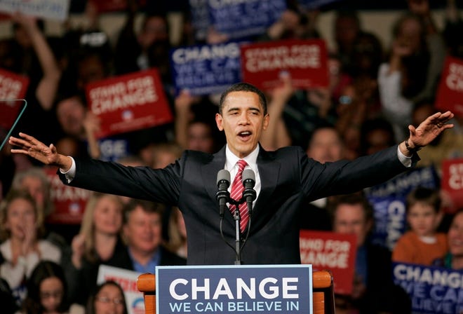 Democratic presidential hopeful Sen. Barack Obama, D-Ill., responds to a warm welcome from the audience during a victory party in Columbia, S.C., on Saturday.