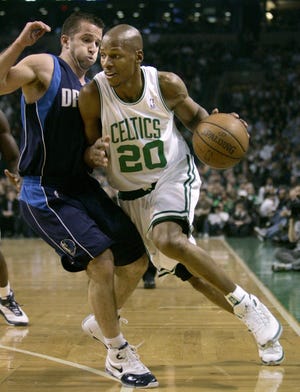 Celtics guard Ray Allen is defended by Dallas guard Jose Juan Barea.