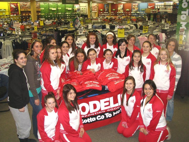 It's been a great year for the Saugus Sachems Midget Cheerleading team who placed second in the nation Dec. 7 at the Walt Disney Wide World of Sports Complex after winning the 2007 North Shore, Eastern Mass and New England Region Championship. Modell's awarded the following cheerleaders with team jackets last week: Shannon Balser, Giana Calcagno, Gina Casazza, Deeana Contino, Katelyn Dennis, Elizabeth Downs, Nicolette Ford, Gianna Frisco, Ashley Giuffrida, Kayla Gray, Shannon Hook, Jessica Marino, Alanna Martino, Melissa McCarthy, Jamie Palladino, Deanna Santosuosso, Jillian Smith, Sophia Stockwell, Dana Maegan Tapley, and Courtney Thurell. Pictured at right,Marissa Kelleher, Cheer Coordinator for Saugus Pop Warner, (second from left) Jeana Forestier, Midget cheerleading team Head Coach, and (left) Lauren Sacilato, junior coach, Missing from the photo is Makayla Kelleher, junior coach.