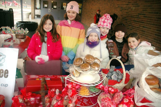 Taking a break from selling long enough to pose for this photo were, from left, Jordan Beck, 8, Olivia Cresta, 8, Megan Fallon, 9, Rebecca Nalesnik, 8, Nicole Benoit, 8, and 8-year-old Victoria Kelsen.