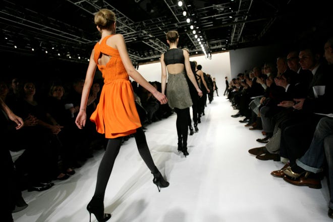 Models walk in the finale of Narciso Rodriguez's fashion show for his 2008 fall collection during Fashion Week in New York recntly.