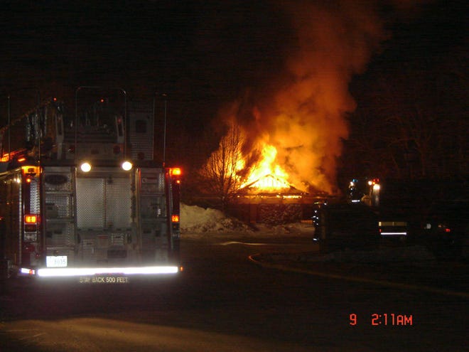 A maintenance building near the swimming pool at The Meadows Apartment complex off Broadmeadow Road was engulfed in flames starting at about 1 a.m. Saturday, Feb. 9, 2008.