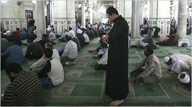 Ahmed Muhammad Sayyid, center, praying at a Cairo mosque, has drawn religion closer after many disappointments.