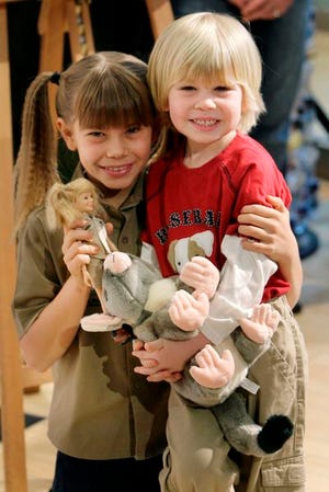 Bindi Irwin, left, and her 4-year-old brother Robert, the children of the late adventurer Steve "The Crocodile Hunter" Irwin, were in New York to promote their new line of toys and their conservation efforts. Bindi, 9, holds an action figure in her likeness from the television series "Bindi the Jungle Girl."