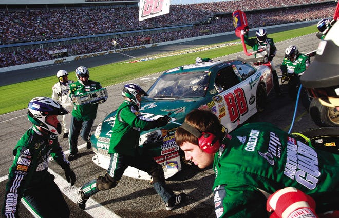 Dale Earnhardt Jr. gets fuel and tires on a pit stop during the Daytona 500 on Sunday.