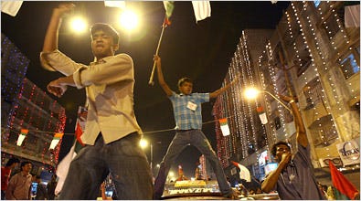 Pakistani supporters of the Muttahida Qaumi Movement party, MQM, react after the closing of the polls in Karachi, Pakistan.