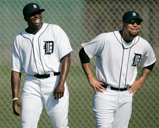 DETROIT PITCHERS JOEL ZUMAYA, RIGHT, and Dontrelle Willis share a laugh during practice Saturday in Lakeland.