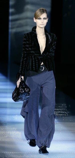 A model wears a creation part of the Giorgio Armani Women's Fall/Winter 2008/2009 collection presented in Milan, Italy, Monday, Feb. 18, 2008.