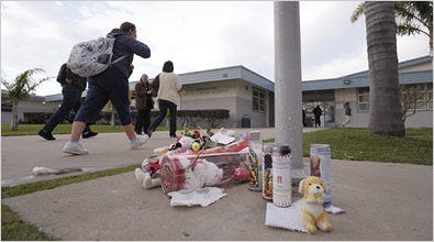 A makeshift memorial at E. O. Green Junior High in Oxnard, Calif., honoring Lawrence King, 15, who was killed at the school.