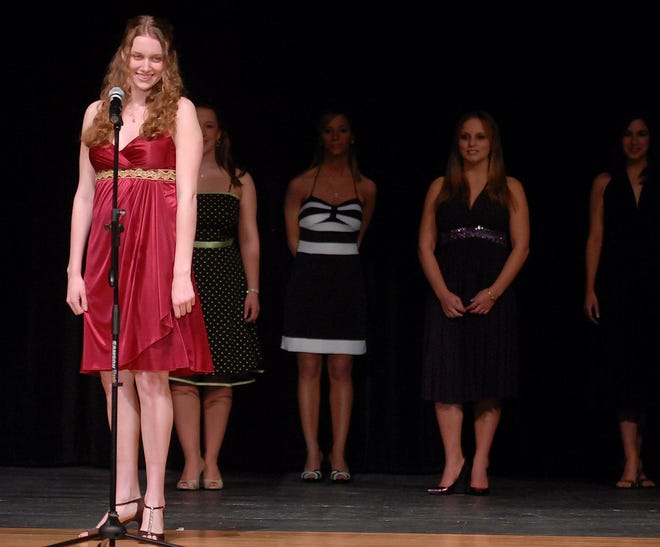 Ann Keckes, 19, a student at Three Rivers Community College, introduces herself to the judges and the crowd at the "Four Points" pageant at Plainfield High School on Saturday, February 23, 2008.