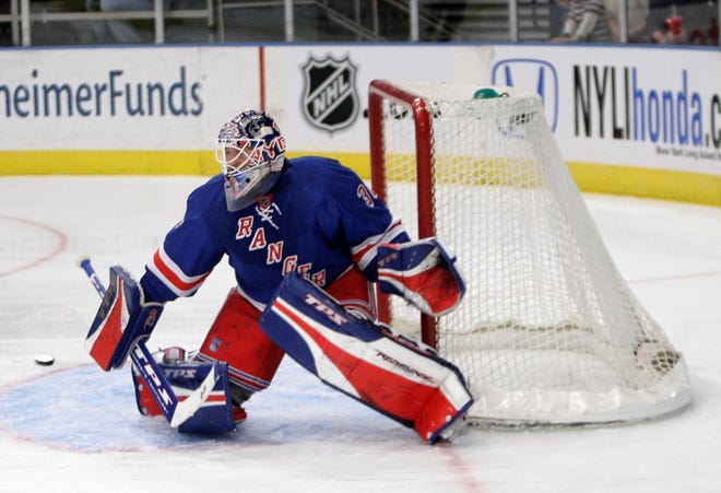 Rangers’ Henrik Lundqvist defends the goal during the first period against the Panthers last night at Madison Square Garden.