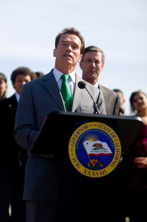 Gov. Arnold Schwarzenegger, and State Superintendent of Public Instruction Jack O'Connell, behind, hold a news conference at Northwood Elementary School, Wednesday Feb. 27, 2008 in Sacramento, Calif. Schwarzenegger on Wednesday recommended severe or moderate sanctions for nearly half the 97 California school districts that have persistently failed to make progress under the No Child Left Behind Act.
