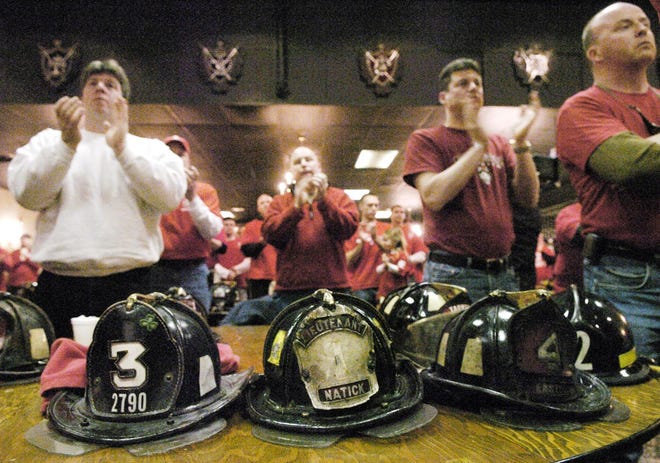 More than 100 firefighters from the region rally at VFW Hall to support fire Capt. Doug Campbell. Firefighters protested the reduced pay and benefits the captain is receiving while on duty in Iraq.