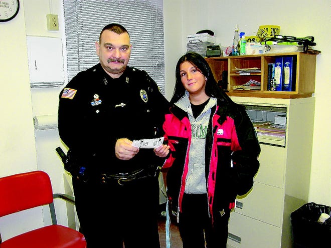 The Herkimer DARE program received a donation on Friday morning. Rina Sutherland, right, presented the donation to DARE officer Anthony Brindisi. The money is expected to be used towards school supplies, incentives and graduation.