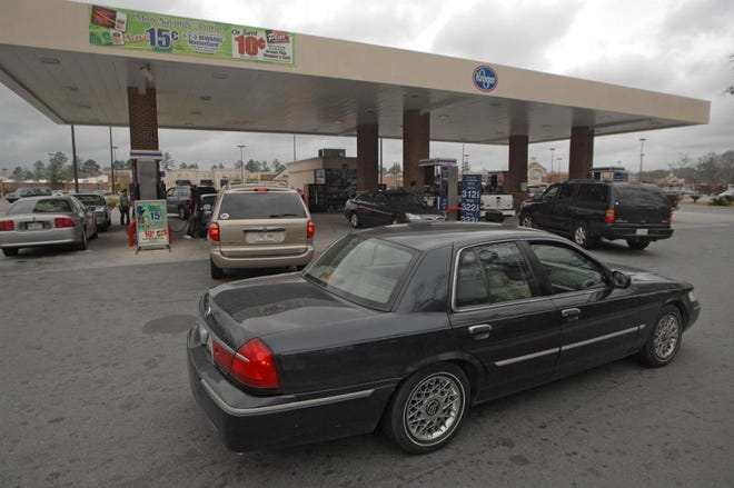 Customers line up at the Kroger in Berwick Plantation as they fill their tanks Tuesday afternoon. Richard Burkhart/Savannah Morning News