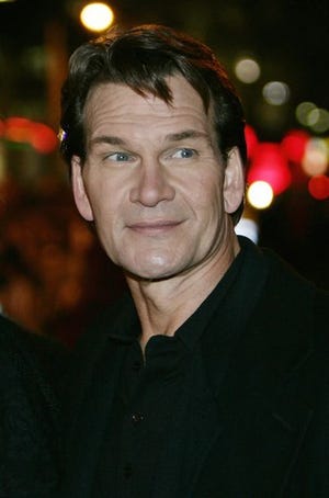 Actor Patrick Swayze poses for the photographers, prior to the premiere of his new film "Keeping Mum" at a Leicester Square cinema in central London, in this Nov. 28, 2005, file photo. A representative for Patrick Swayze says he is being treated for pancreatic cancer but is well enough to continue working. The "Dirty Dancing" actor has a very limited amount of disease and appears to be responding well to treatment, according to Dr. George Fisher, Swayze's physician. The doctor's prognosis was included in a statement released today by Swayze's representative, Annett Wolf.