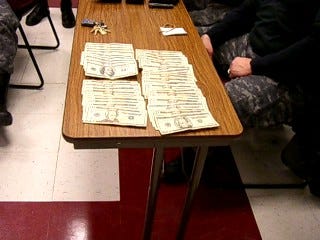 Police seized $7,600 in cash in a raid on a Rockland apartment.