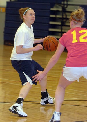 Lincoln-Sudbury guard Sarah Wetmore looks to make a move against Katie Broecker during practice.
